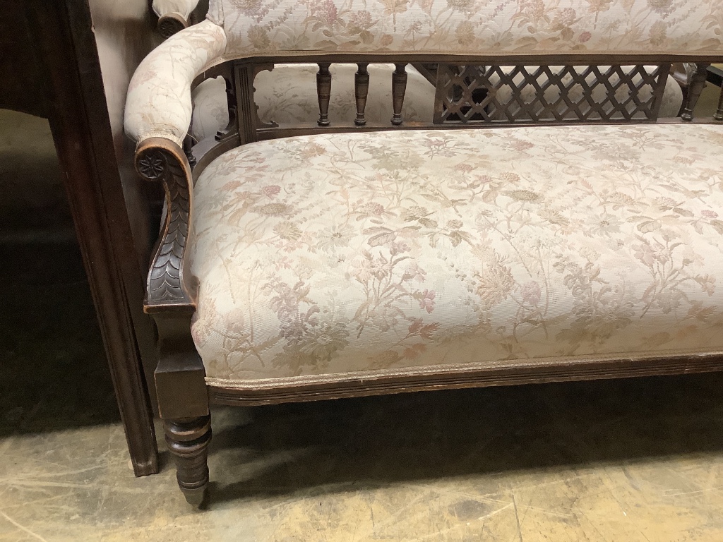 A Victorian mahogany three piece salon suite, settee width 134cm depth 64cm height 76cm